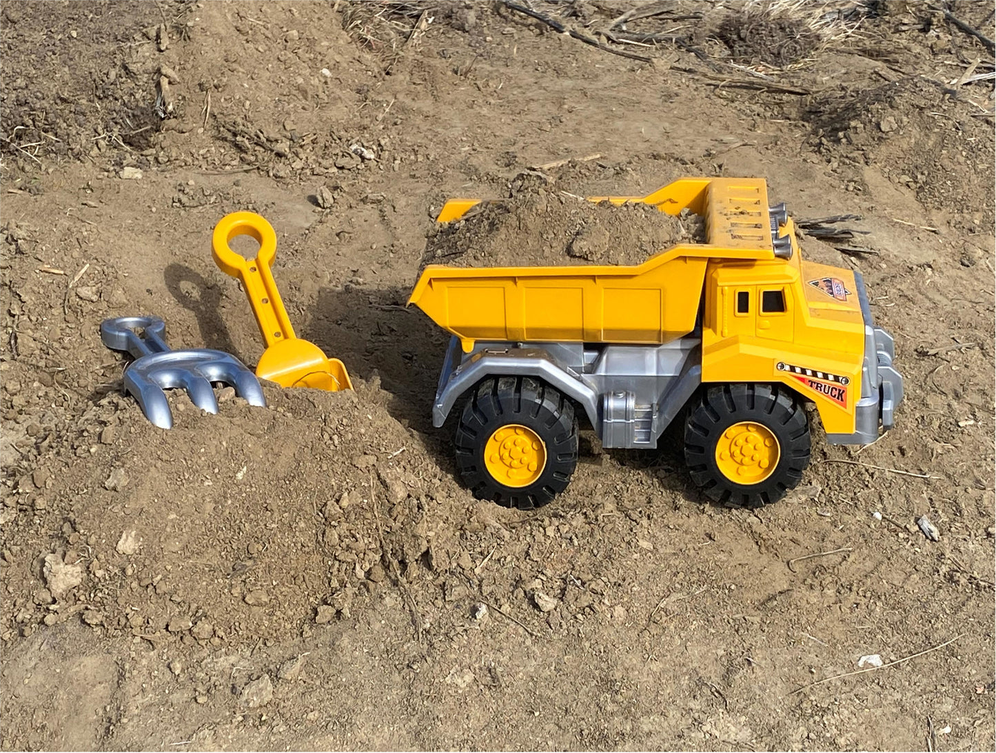 Big Dump Truck comes with a Shovel and Rake